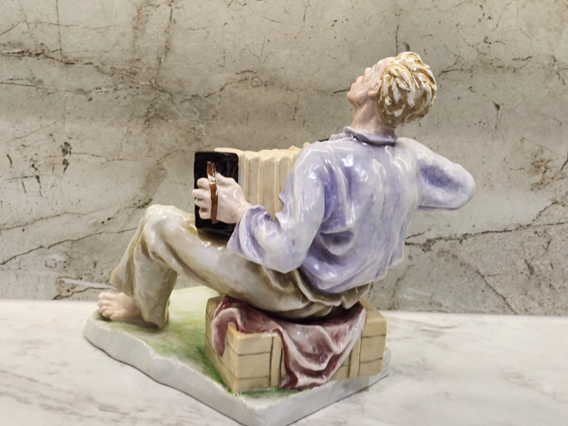 Decorative Figurine of a Boy, Handcrafted Ceramic Sculpture