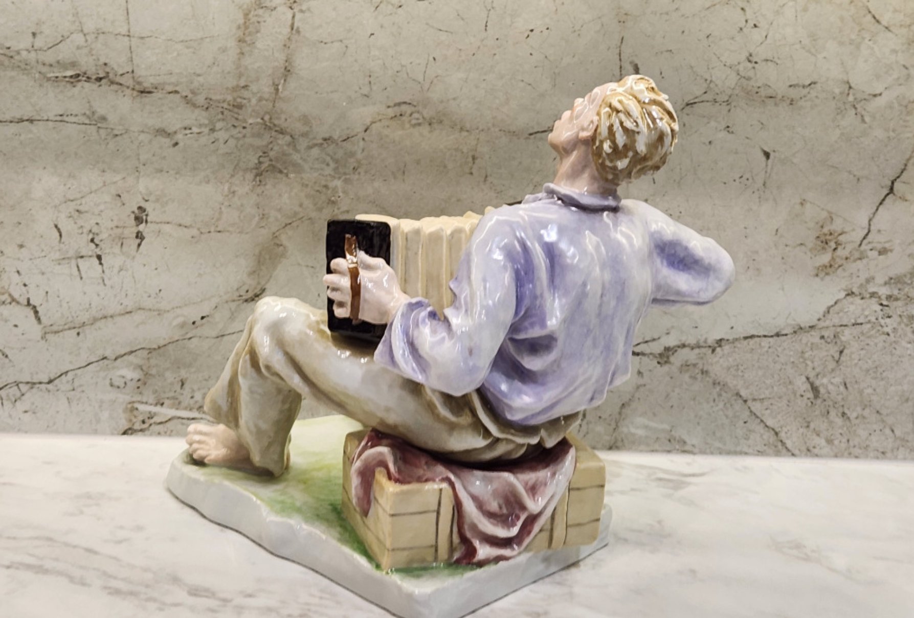 Decorative Figurine of a Boy, Handcrafted Ceramic Sculpture